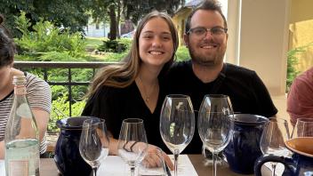 2 members at a wine tasting